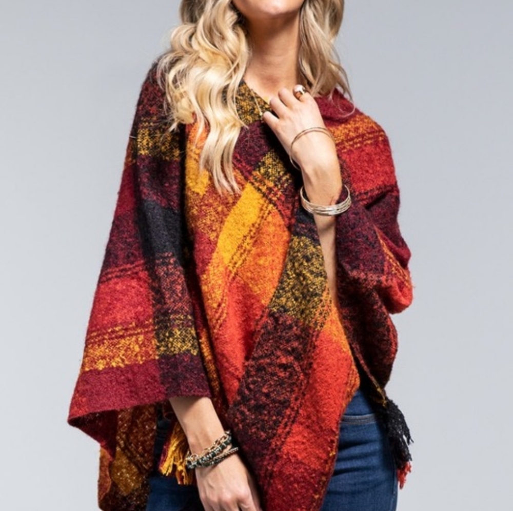 Fall Favorite Yarn Ponchos. Let us know which design you like to order.
